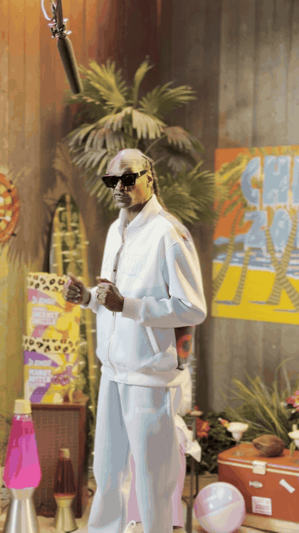 Snoop Dogg dancing on the Dr. Bombay set
